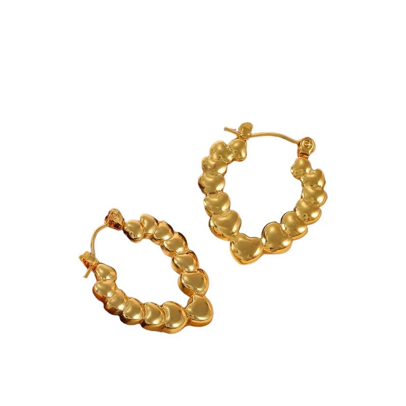 Stainless steel druppelvormige oorringen met hartjesmotief - oor6405 - 792418 - Oorringen kopen# - 26mm - alles - cadeau