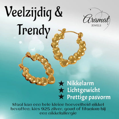 Stainless steel druppelvormige oorringen met hartjesmotief - oor6405 - 792418 - Oorringen kopen# - 26mm - alles - cadeau