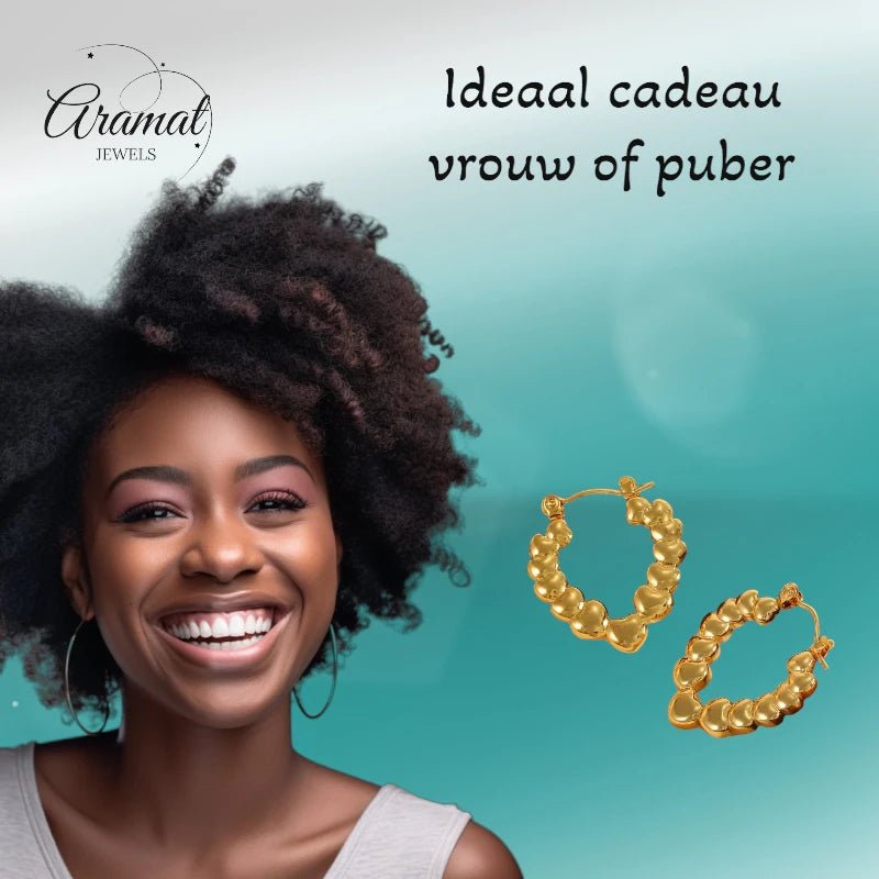 Stainless steel druppelvormige oorringen met hartjesmotief - oor6405 - 792418 - Oorringen kopen# - 26mm - alles - cadeau