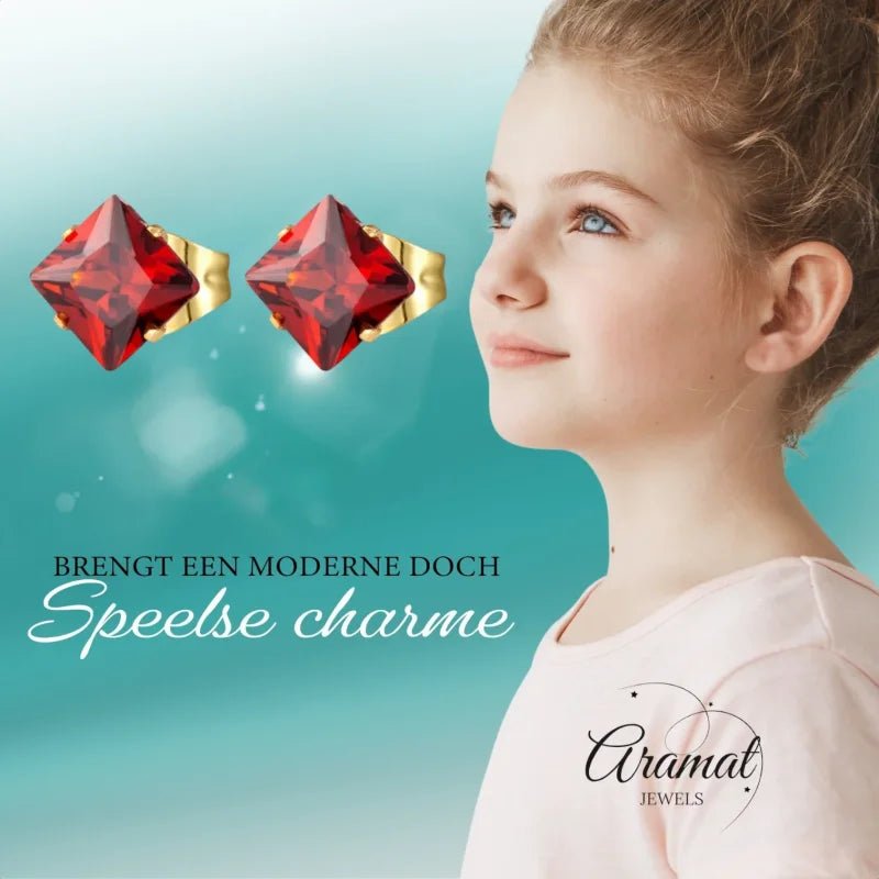 Vierkante oorbellen met rode edelsteen.