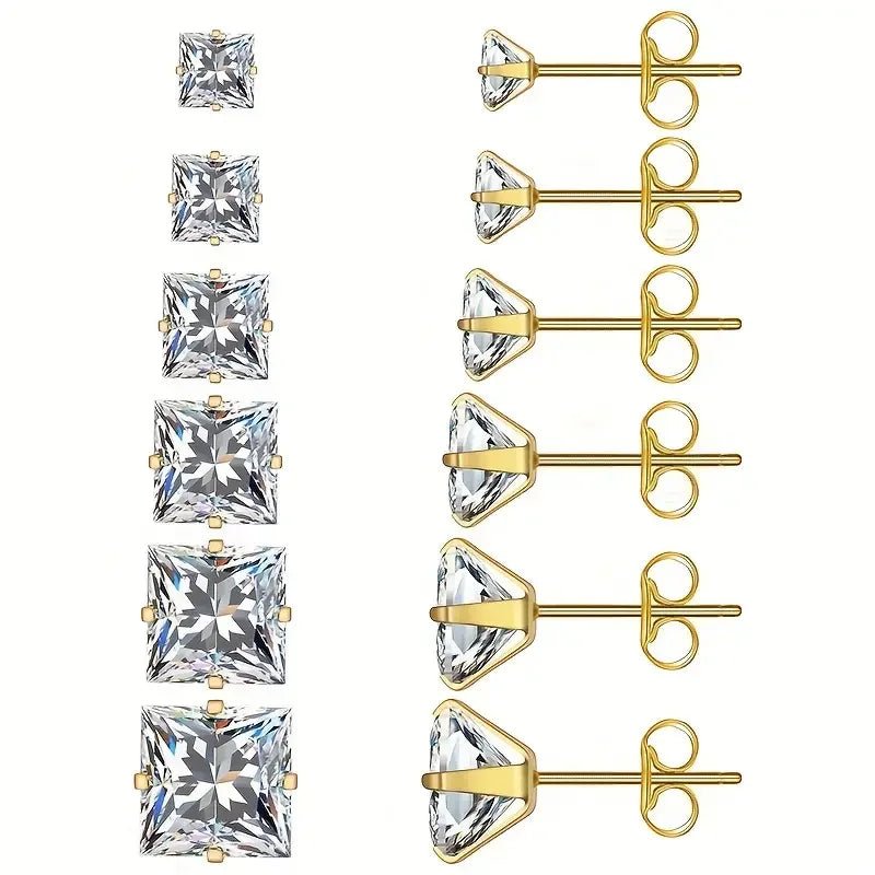 Gouden oorbellen met princess-geslepen kristallen in verschillende maten.