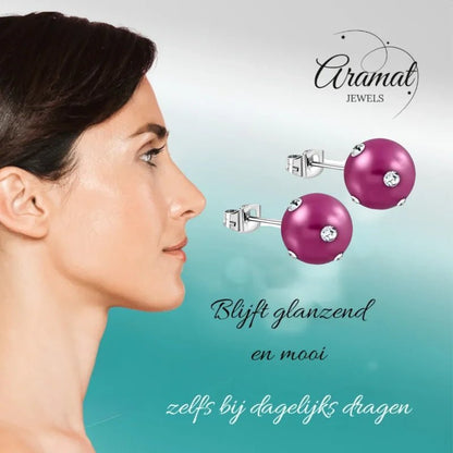 Parel en kristallen oorbellen.