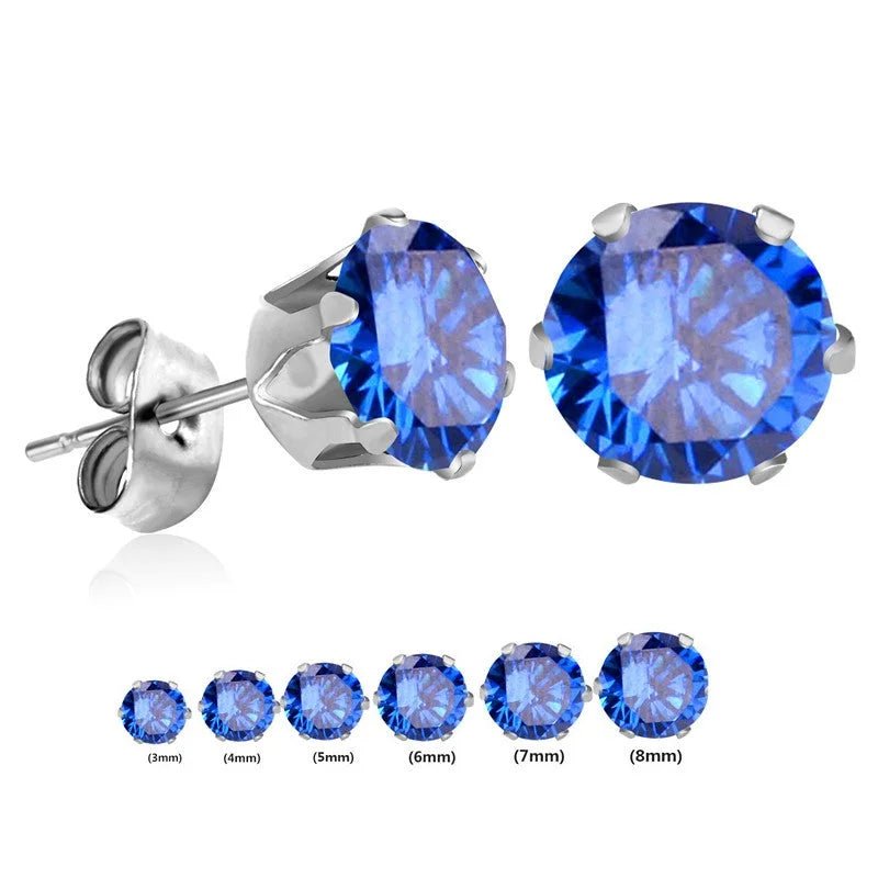 Een paar oorbellen met blauwe saffier