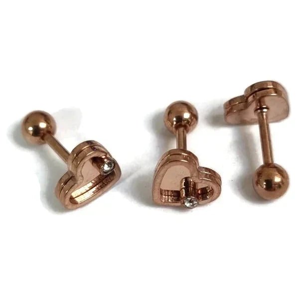 Een paar koperkleurige metalen schroeven