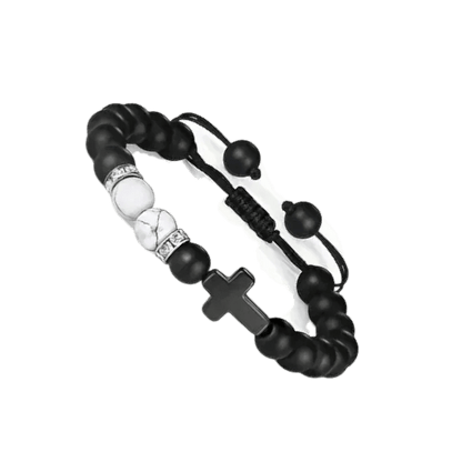 Een zwart-witte armband met een doodshoofd