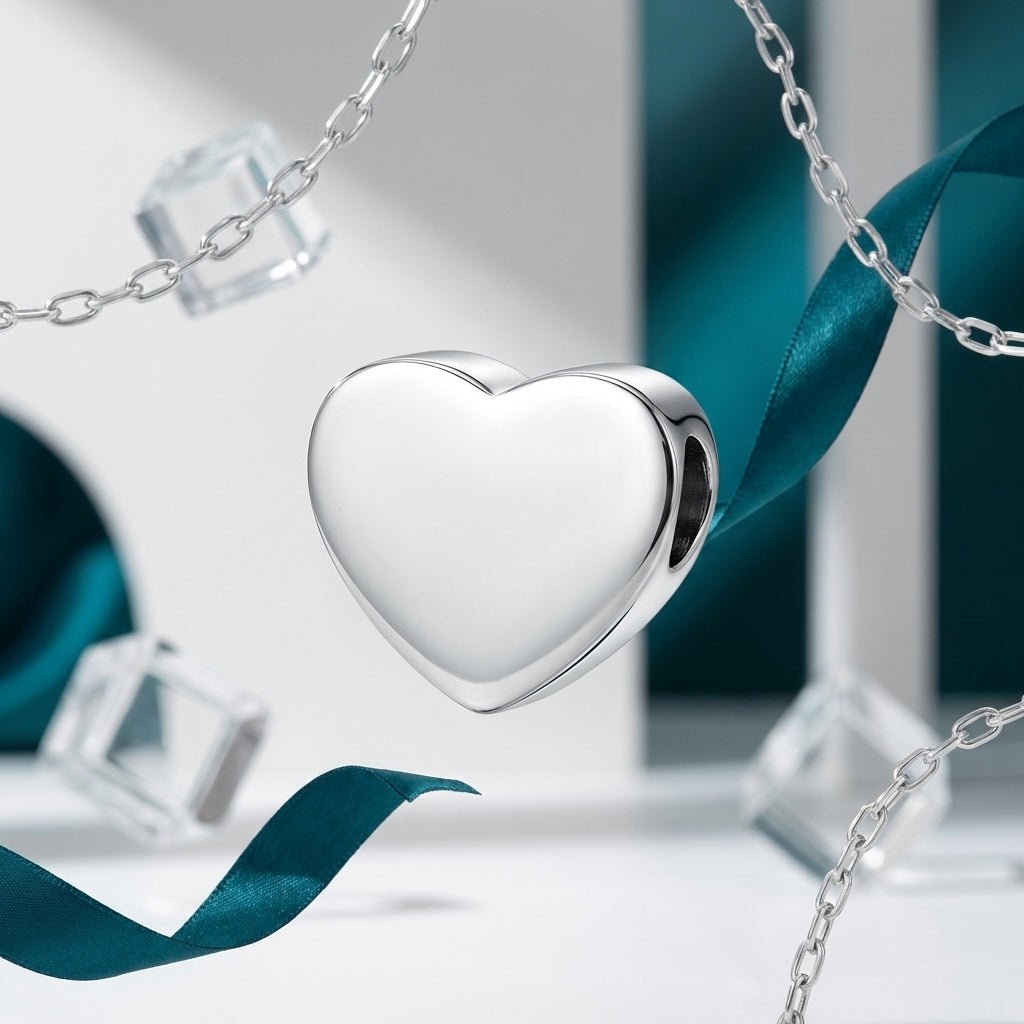 Zilverkleurige asbedel hart – roestvrij staal 13mm - Aramat Jewels - Asbedels - cadeautip