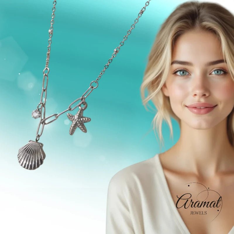 Zilverkleurige bedelketting met zeester, schelp & zirkonia – 40+5 cm - ket1183 - 658906 - Halskettingen kopen# - 40cm - alles - Bedelketting