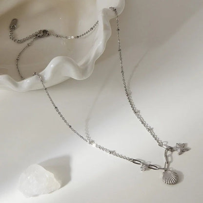 Zilverkleurige bedelketting met zeester, schelp & zirkonia – 40+5 cm - ket1183 - 658906 - Halskettingen kopen# - 40cm - alles - Bedelketting