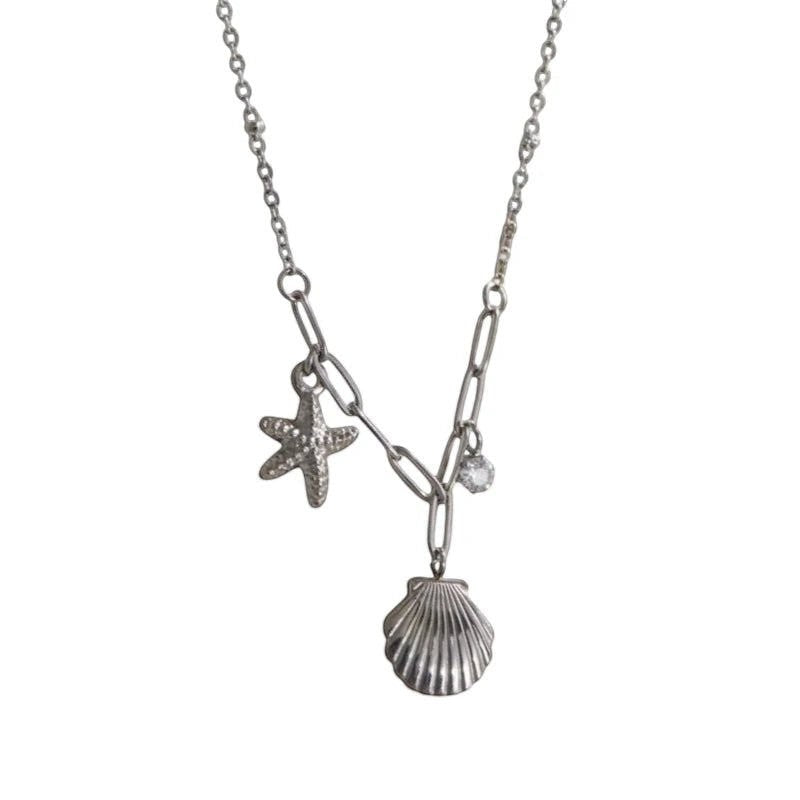 Zilverkleurige bedelketting met zeester, schelp & zirkonia – 40+5 cm - ket1183 - 658906 - Halskettingen kopen# - 40cm - alles - Bedelketting