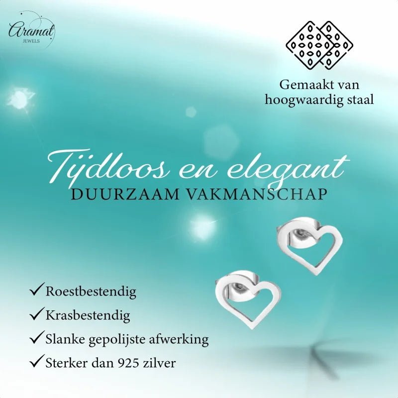 Zilveren hartvormige oorbellen.